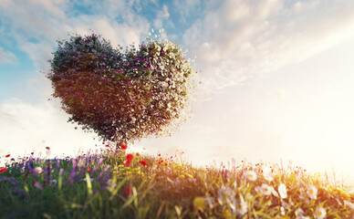 Fototapeta na wymiar Heart shape tree on spring meadow Valentines Day love