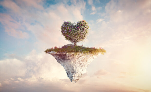 Heart shape tree on floating island in clouds