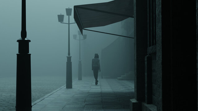 silhouette of a woman walking alone in the fog on lonely moody cobblestone street