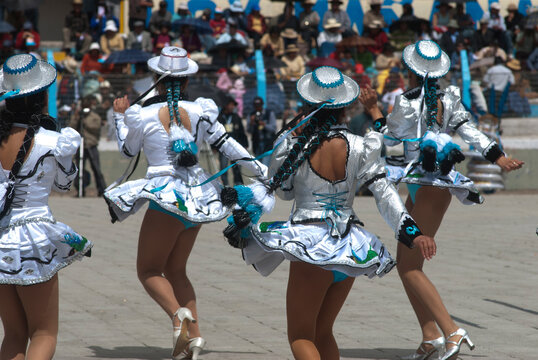 PERU, FEB 03, 2019: people with mask ,playing music  and dancer in carnaval Festival of the Virgen de la Candelaria from Puno typical peruvian dance, La diablada
