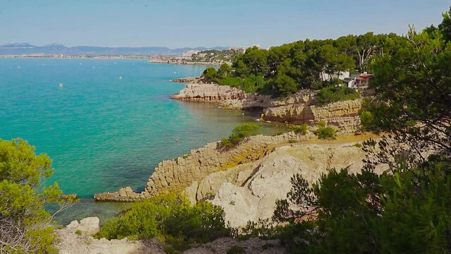 Beautiful landscape of rock formations on the La Pineda beach in Salou Spain.