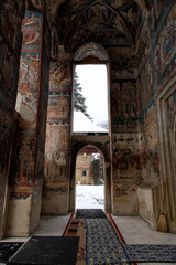 Moldovita, Romania, 2021-12-30. Moldovita Monastery, in the Bukovina region. Its exterior walls are...