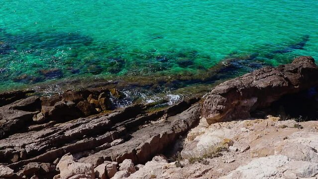 Beautiful landscape of rock formations on the La Pineda beach in Salou Spain.