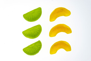 Multicolored fruit marmalade on a white background.