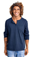 Young hispanic man wearing casual clothes with a happy and cool smile on face. lucky person.