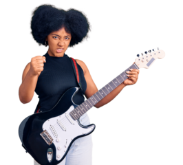 Young african american girl playing electric guitar annoyed and frustrated shouting with anger, yelling crazy with anger and hand raised
