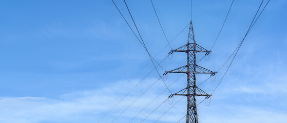 A transmission tower, also known as an electricity pylon. The concept of the energy crisis.