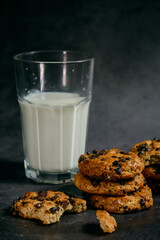 a glass of milk and a stack of biscuits