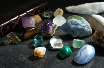 various gem stones on dark background
