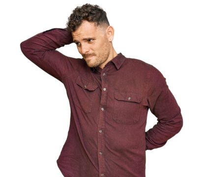 Young hispanic man wearing casual clothes suffering of neck ache injury, touching neck with hand, muscular pain