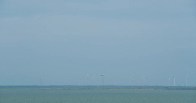 Wind turbines for electric power production. wind energy farm. wind turbine Mills park making electic energy from wind