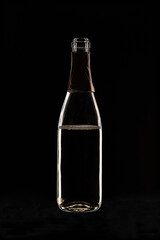 champagne bottle on black background