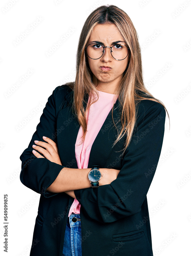 Poster hispanic young woman with arms crossed gesture skeptic and nervous, frowning upset because of proble