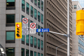 Fototapeta na wymiar Traffic light in street with buildings in downtown district of Ottawa, Canada