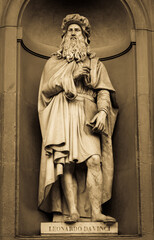 Leonardo da Vinci - Statue of the genius, located in front of Uffizi Gallery in Florence, Italy, in...
