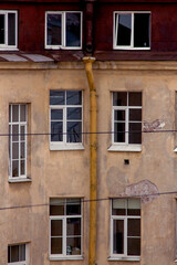 Fototapeta na wymiar windows of old houses in St. petersburg