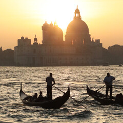Gondoliers in backlit at Venice, square composition