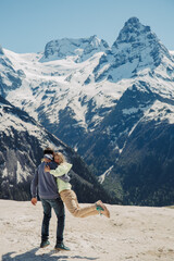 couple in love in the mountains have fun