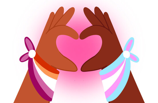 Manos morenas haciendo un coraz&oacute;n con bandera trans y bandera l&eacute;sbica