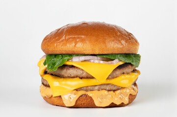 Closeup of a double beef burger with American cheese and brioche