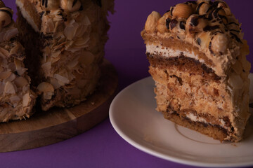 photo of a cut piece of pecan cake on a white saucer