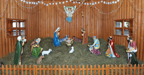 Traditional Christmas nativity scene with Mary and Joseph and baby Jesus in the manger.