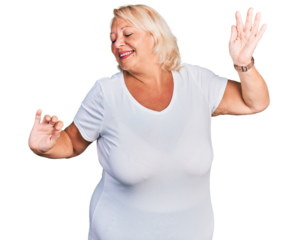 Middle age blonde woman wearing casual white t shirt stretching back, tired and relaxed, sleepy and yawning for early morning