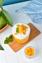 King Mango Thai is a mango juice drink from Thailand combined with whipped cream and yogurt, served...