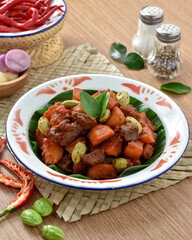 Sambal goreng kentang hati ampela. The chili sauce for fried potatoes ati ampela is a red balado seasoning that is added with candlenut and shrimp paste. Eid al-Fitr menu, served on plate