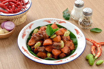 Sambal goreng kentang hati ampela. The chili sauce for fried potatoes ati ampela is a red balado seasoning that is added with candlenut and shrimp paste. Eid al-Fitr menu, served on plate