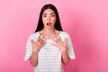 Portrait of shocked indonesian lady arms touch chest open mouth cant believe isolated on pink color background