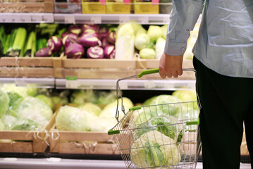 buying vegetables (cabbage, cauliflower, broccoli)