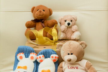 Teddy bears with a gift. Birthday and Christmas. Holidays and toys