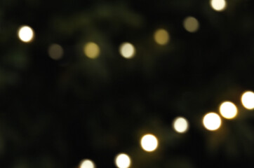 gold christmas holiday new year string lights bokeh overlay on a black background