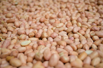 Close up stacks of raw beans or nuts.