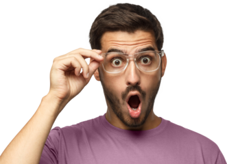 Studio portrait of young man dressed in pink t-shirt, holding glasses looking with round open mouth with surprise