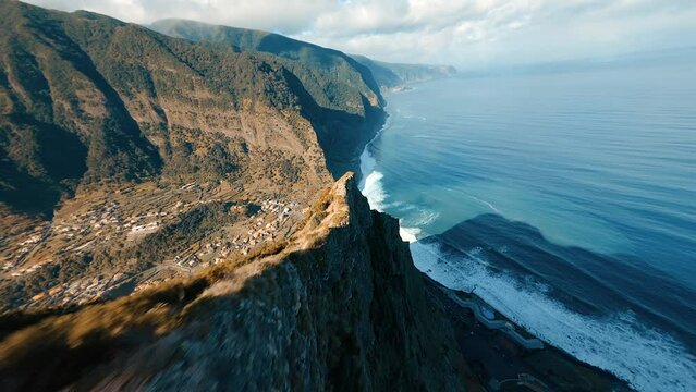 Drone flying over a cliff in the mountains on the island of Madeira in Portugal
