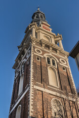 Fototapeta na wymiar Zuiderkerk (Southern church) - XVII century Protestant church in Amsterdam Nieuwmarkt area. Church constructed in 1611, church tower (1614) dominates surrounding area. Amsterdam. Netherlands.