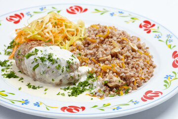 buckwheat with cutlet on plate