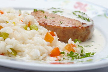 cutlet with rice and sauce