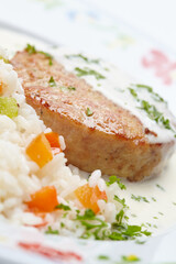 cutlet with rice and sauce