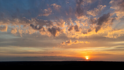sunset with picturesque clouds