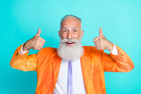 Photo Of Positive Satisfied Person Arms Fingers Demonstrate Thumb Up Isolated On Turquoise Color Background