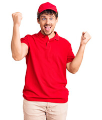 Young handsome man with curly hair wearing delivery uniform screaming proud, celebrating victory and success very excited with raised arms