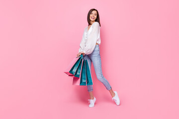 Full length photo of pretty adorable lady skinny figure dressed trendy clothes enjoy new collection...