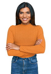 Young latin transsexual transgender woman wearing casual clothes happy face smiling with crossed arms looking at the camera. positive person.