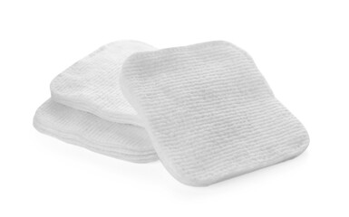 Soft clean cotton pads on white background