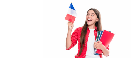 travel to france. learn foreign language. surprised teen girl hold french flag and workbook. Horizontal isolated poster of school girl student. Banner header portrait of schoolgirl copy space.