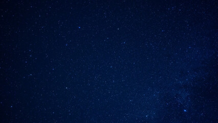 Fototapeta premium Starry sky in the mountains with the Milky Way at the end of summer
