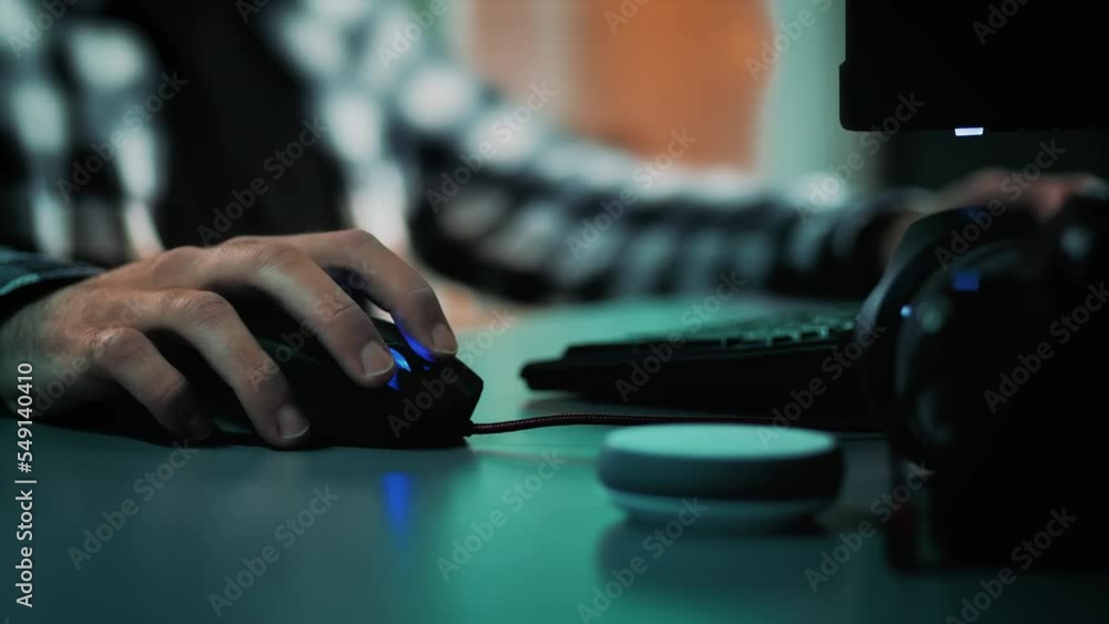 Poster male hands scrolling and typing on computer mouse and keyboard. designer or data analyst developing 